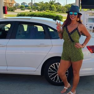 Adorable green and navy romper